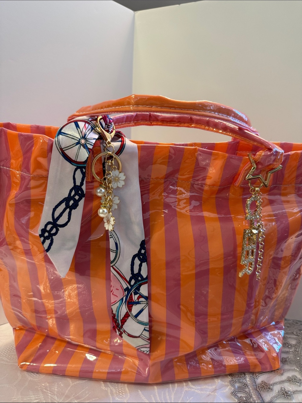 Bright Orange and Pink Striped Tote with Decorative Charm